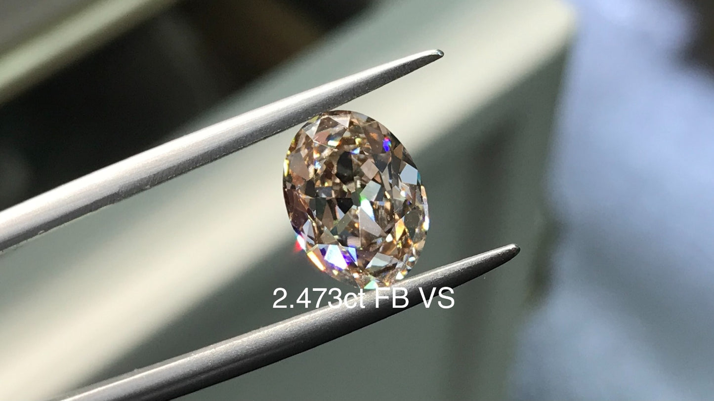 2.437ct elongated oval champagne diamond